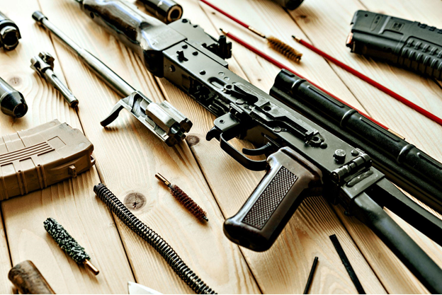 AK-pattern parts kit laid out mid-build, ready for assembly onto a receiver